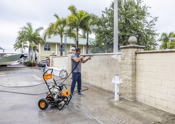 man pressure washing with RB 800