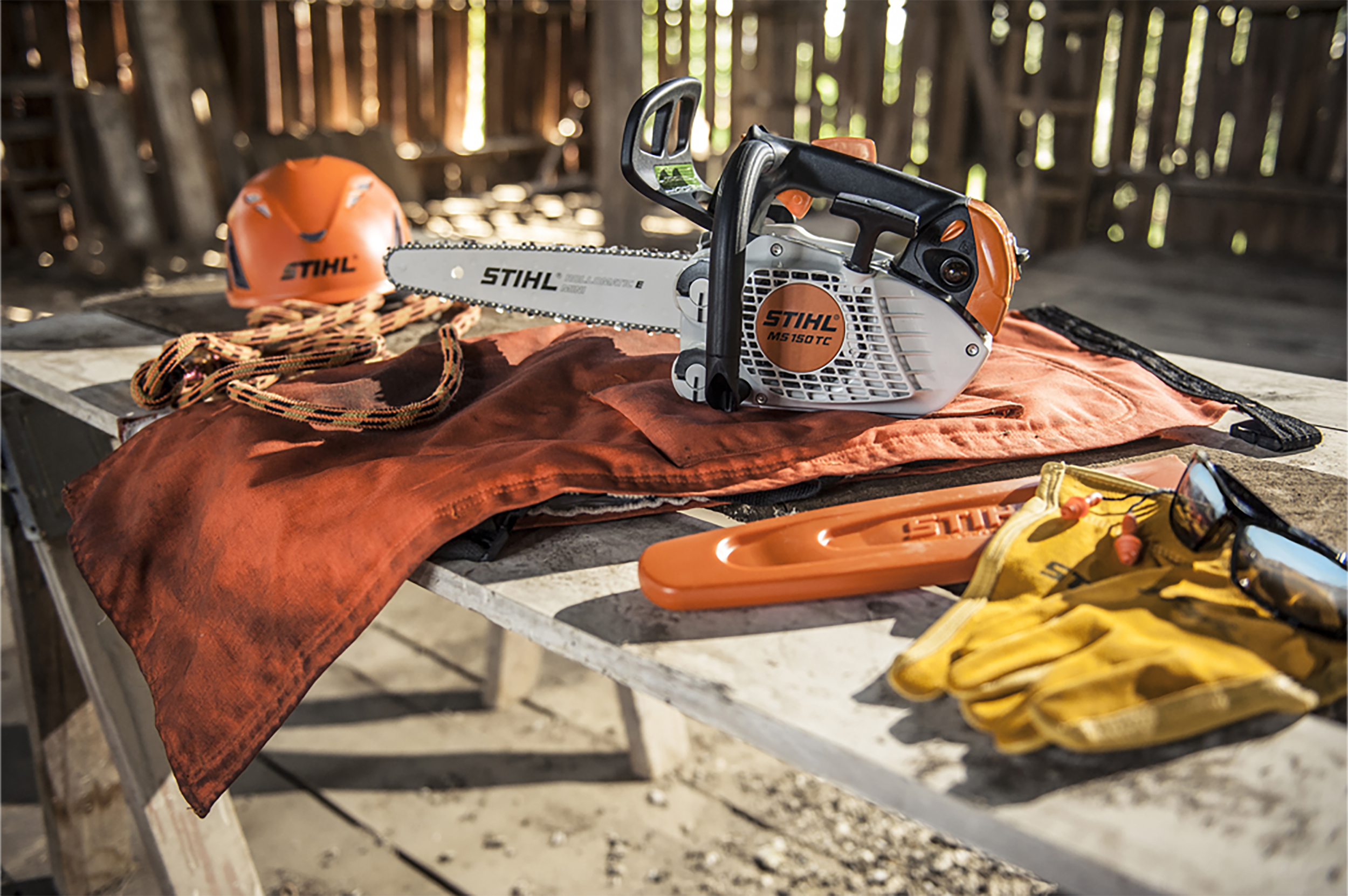 Chainsaw chaps and a chainsaw ready to get to work