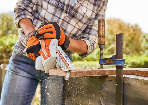 GTA26 Woman using GTA26 to cut branch