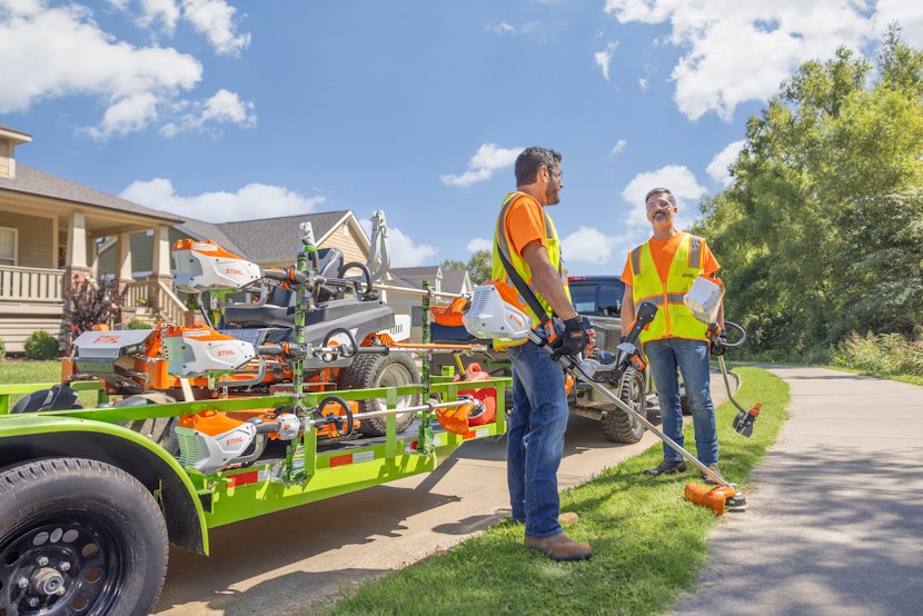 Landscapers with trailer full of STIHL tools