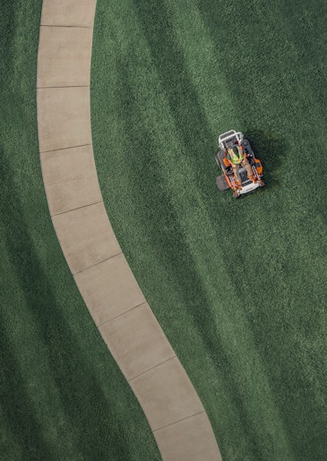 Person driving STIHL RZ 760i mower