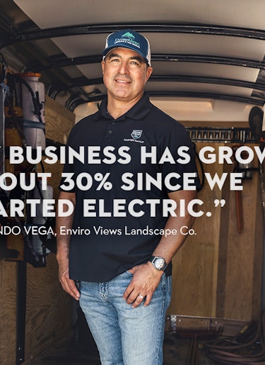 Armando Vega | Enviro Views Landscape Co. Landscaper in work truck with quote.
